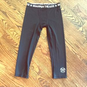 Sharpen The Axe men’s tights. Mid calf.